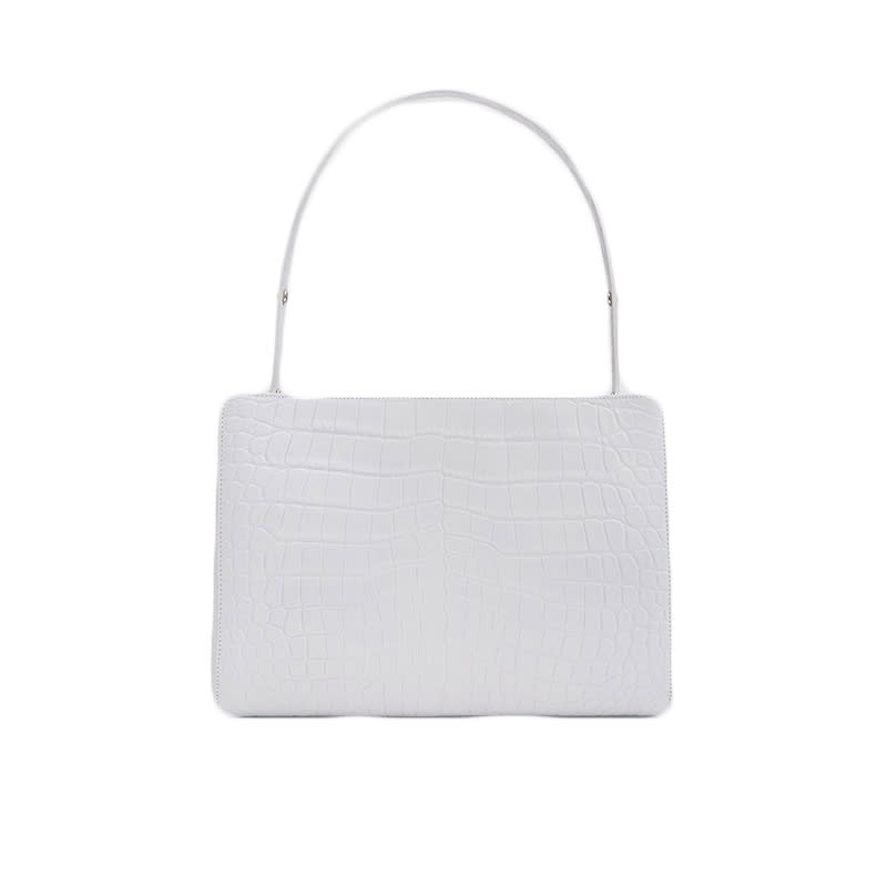 <a rel="nofollow noopener" href="https://rstyle.me/n/cwebacchdw" target="_blank" data-ylk="slk:Small Shopper Bag in White Croc, Little Liffner, $475;elm:context_link;itc:0;sec:content-canvas" class="link ">Small Shopper Bag in White Croc, Little Liffner, $475</a>