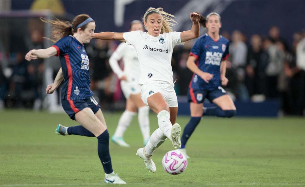  Maitane Lopez #77 of Gotham FC defending against Rose Lavelle #16 of OL Reign during NWSL Cup Final game between NJ/NY Gotham City FC and OL Reign at Snapdragon Stadium on November 11, 2023 in San Diego, California. 