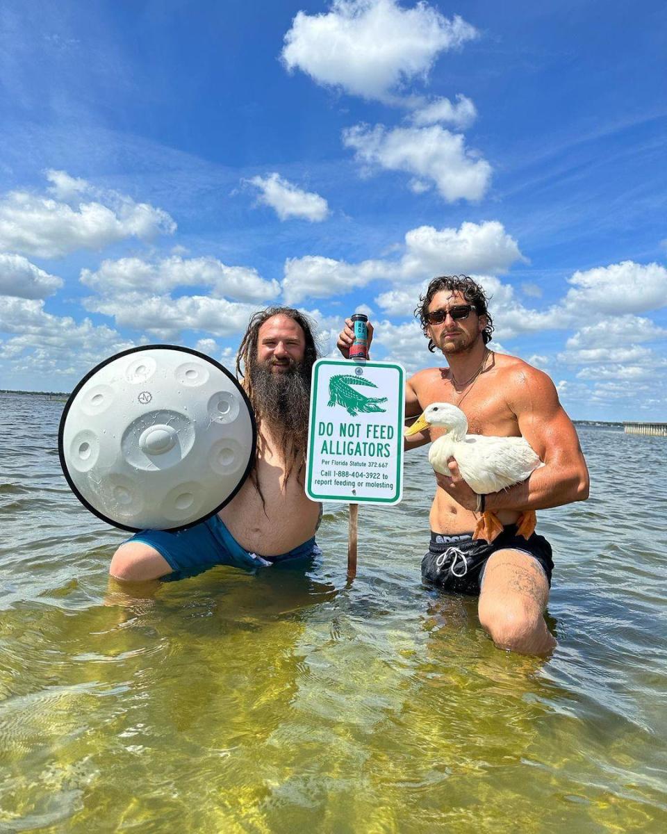 TooTurntTony in the lake with his friend