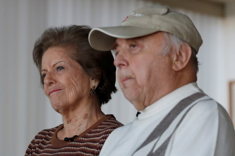 Lea Evron and her husband Yehuda listen to a question during an interview at their apartment in the Queens borough of New York