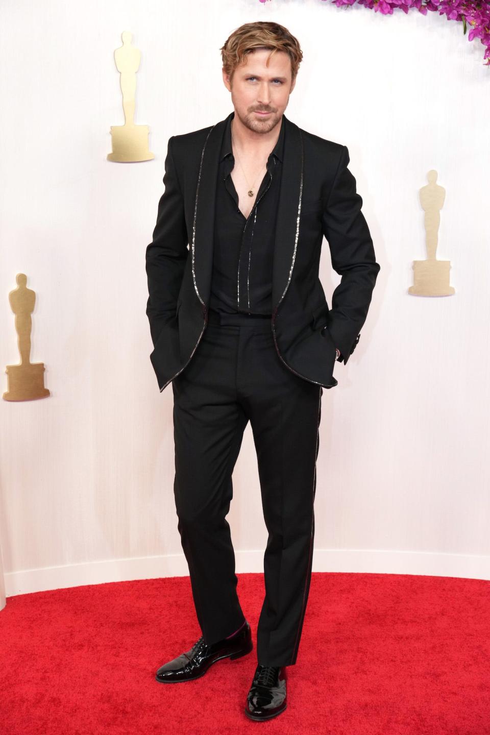 Ryan Gosling in a black suit.