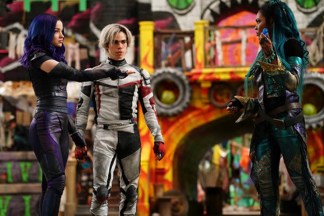 <p>David Bukach/Disney Channel via Getty</p> Dove Cameron, Cameron Boyce and China Anne McClain in Descendants 3