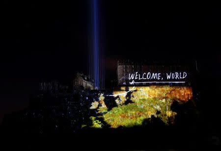 A digital light show called "Deep Time" is beamed onto Edinburgh Castle to mark the start of the Edinburgh Fringe Festival in Edinburgh, Scotland, Britain August 7, 2016. REUTERS/Scott Heppell