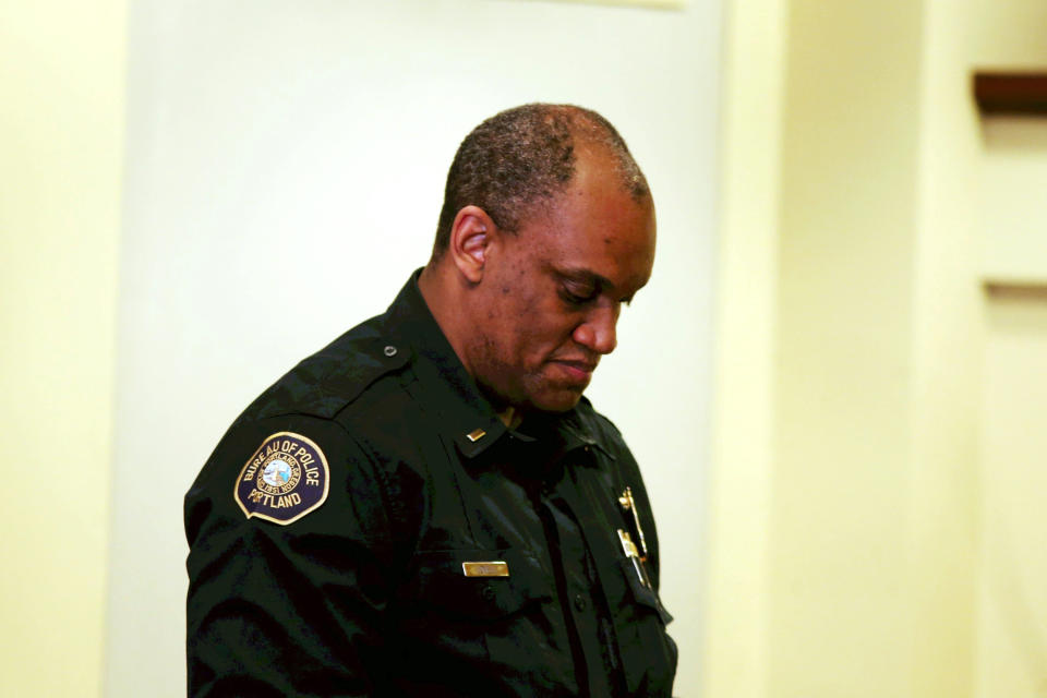 NewPortland Police Chief Chuck Lovell listens during a news conference announcing his appointment Monday, June 8, 2020 in Portland, Ore. Portland's police chief has resigned, just six months into her job, amid criticism of her department's handling of protests in Oregon's largest city. The shakeup comes as police have been sharply criticized for using what some people called inappropriate force against some protesters. Lovell said at a press conference that his appointment was completely unexpected and he's going to care about the community. (Beth Nakamura/The Oregonian via AP)