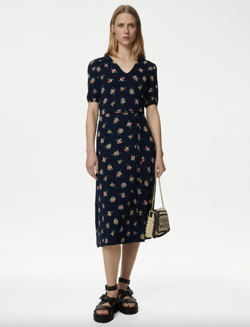 Perfect for weddings, BBQs and the office, you can't go wrong with this midi style. (Marks & Spencer)
