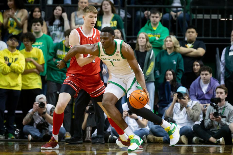 Oregon center N'Faly Dante drives toward the basket as the Oregon Ducks host the Utah Utes Saturday, March 9, 2024 at Matthew Knight Arena in Eugene, Ore.