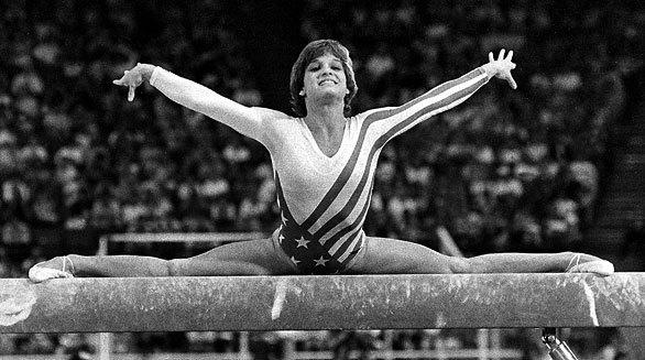 Mary Lou Retton performs on the balance beam.