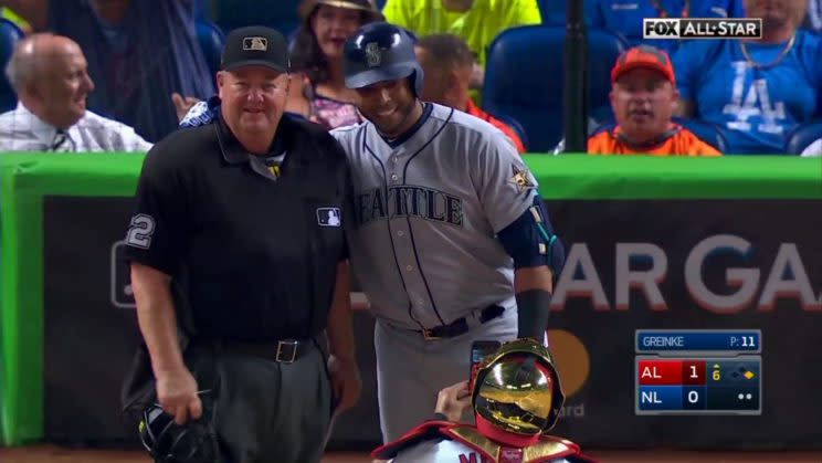 Nelson Cruz takes a pic with Joe West during the All-Star game. (FOX)