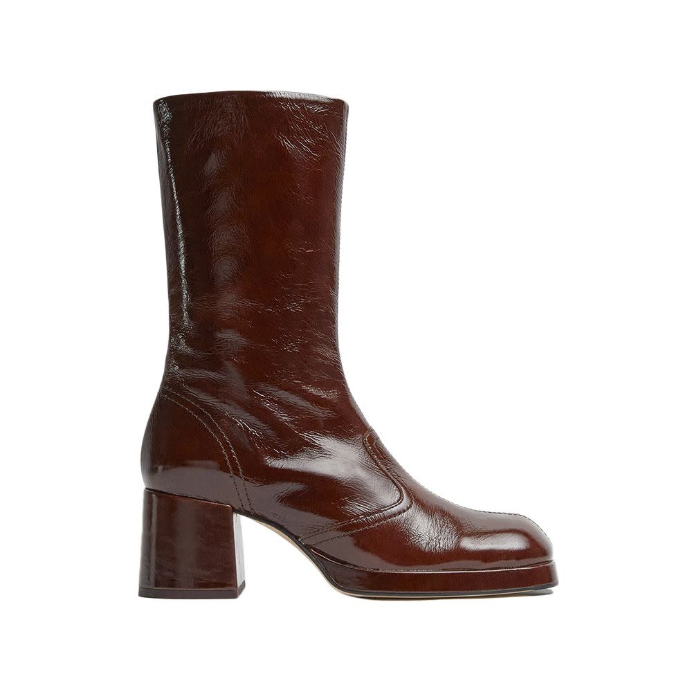 <p><a href="https://www.miista.com/en-US/cass-brown-patent-boots" rel="nofollow noopener" target="_blank" data-ylk="slk:Shop Now;elm:context_link;itc:0;sec:content-canvas" class="link rapid-noclick-resp">Shop Now</a></p><p>Cass Brown Patent Boots</p><p>miista.com</p><p>$495.00</p>