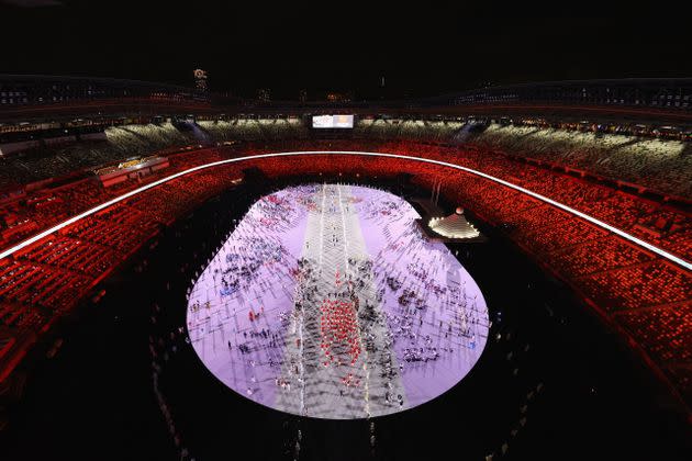 Members of Team China enter the stadium. (Photo: Richard Heathcote via Getty Images)