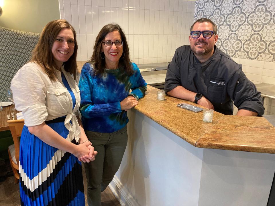 Lohud Food & Dining Reporter Jeanne Muchnick, center, with the husband-and-wife owners of Augustine's Salumeria in Mamaroneck, Brianne Myers (left) and Chef Marc Taxiera. Photographed June 2022.