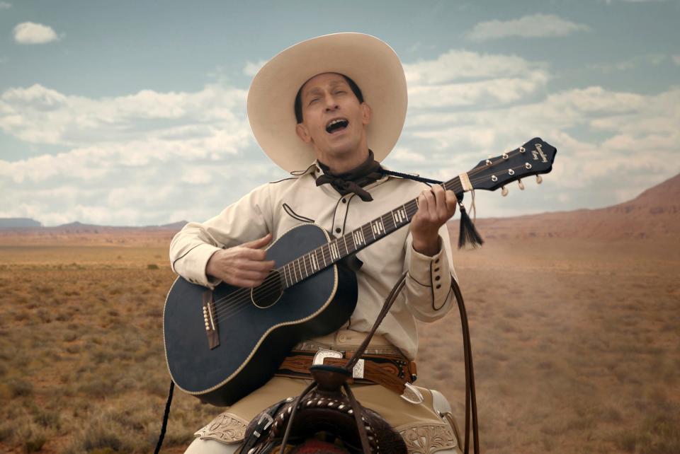 This image released by Netflix shows Tim Blake Nelson as Buster Scruggs in a scene from "The Ballad of Buster Scruggs," a film by Joel and Ethan Coen.