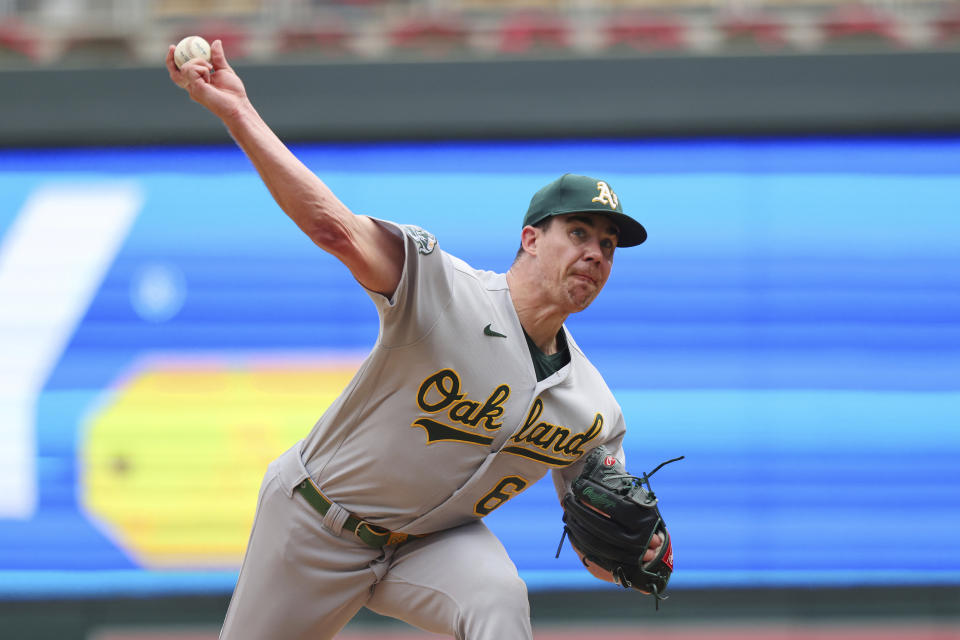 Oakland Athletics relief pitcher Trevor May delivers during the ninth inning of the team's baseball game against the Minnesota Twins Thursday, Sept. 28, 2023, in Minneapolis. (AP Photo/Andy Clayton-King)