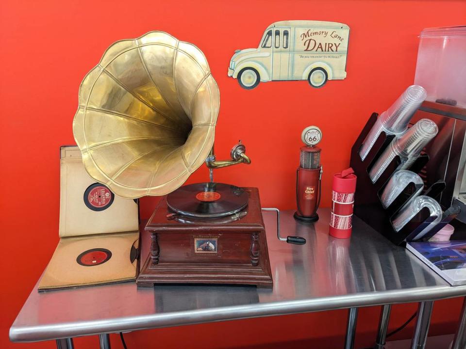 An old-style record player and collection of records behind the counter at The Sugar Shack Café in Granite City