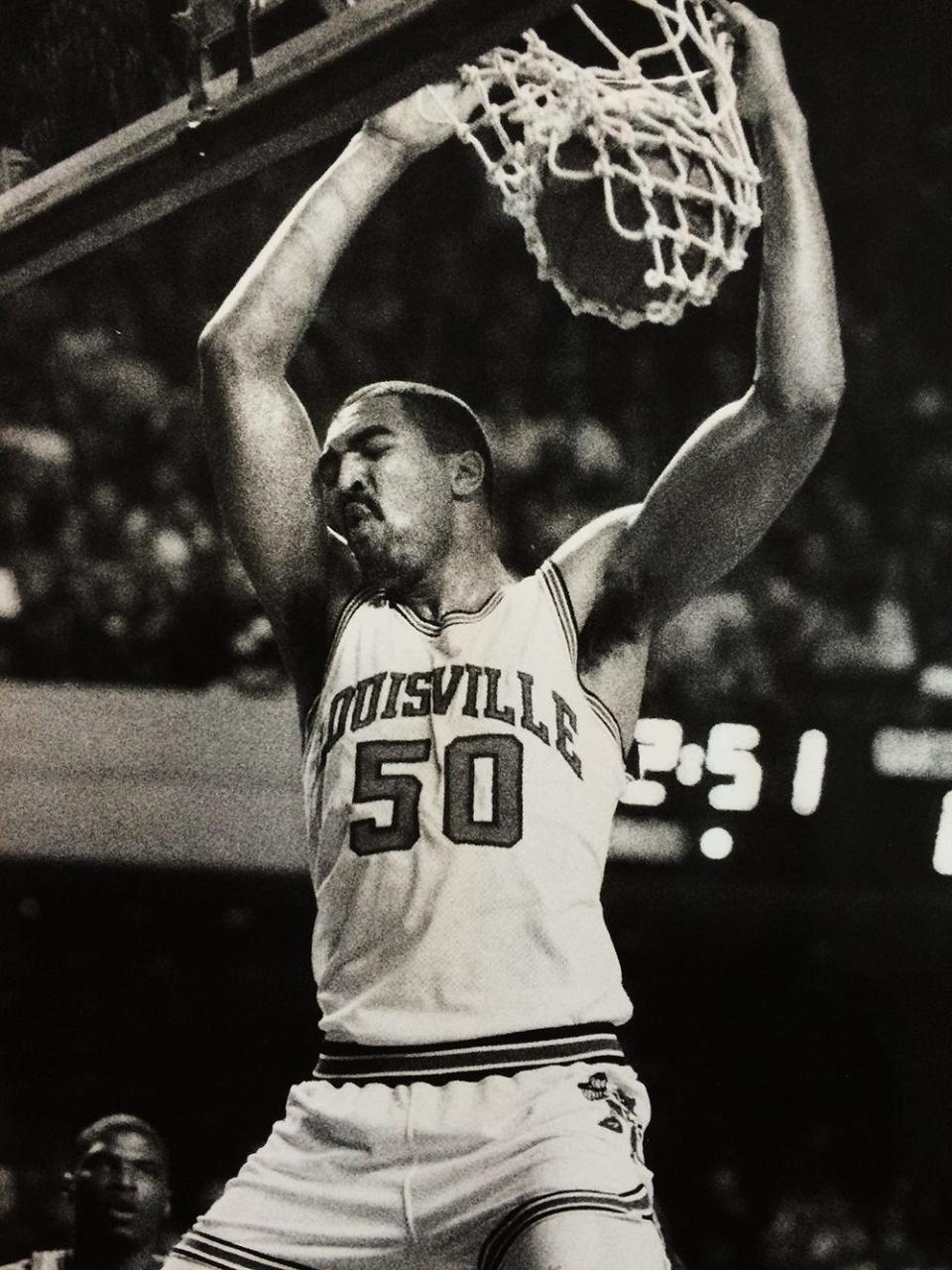 Felton Spencer was a two-fisted dunker yesterday. The 7-foot senior had 25 points, 11 rebounds and three blocked shots as Louisville defeated Memphis State 86-69. 1/21/90.