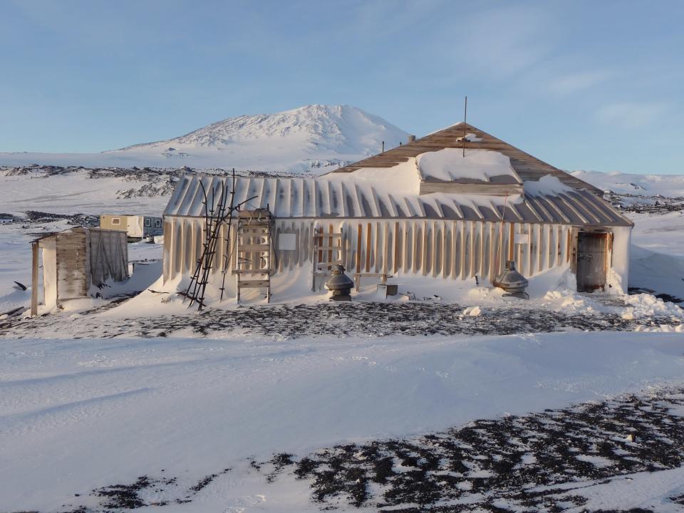 Scott’s hut at Cape Evans today, with Mount Erebus in the background. One hundred years on, the hut built by Scott and his team still stands. Since 1911 it has survived many Antarctic winters and endured countless blizzards that have scoured its outer wooden walls. Today, it is cared for on behalf of the international community by the New Zealand Antarctic Heritage Trust. © New Zealand Antarctic Heritage Trust