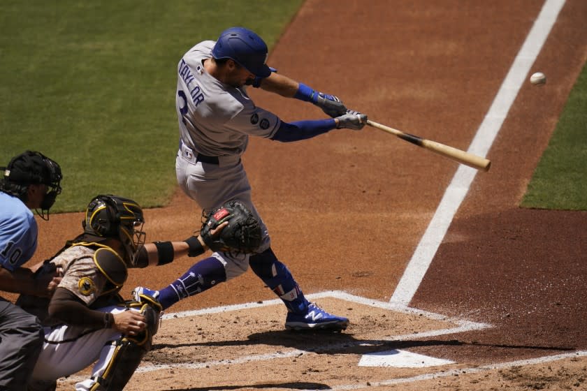 Los Angeles Dodgers' Chris Taylor hits a two-run home run during the second inning.