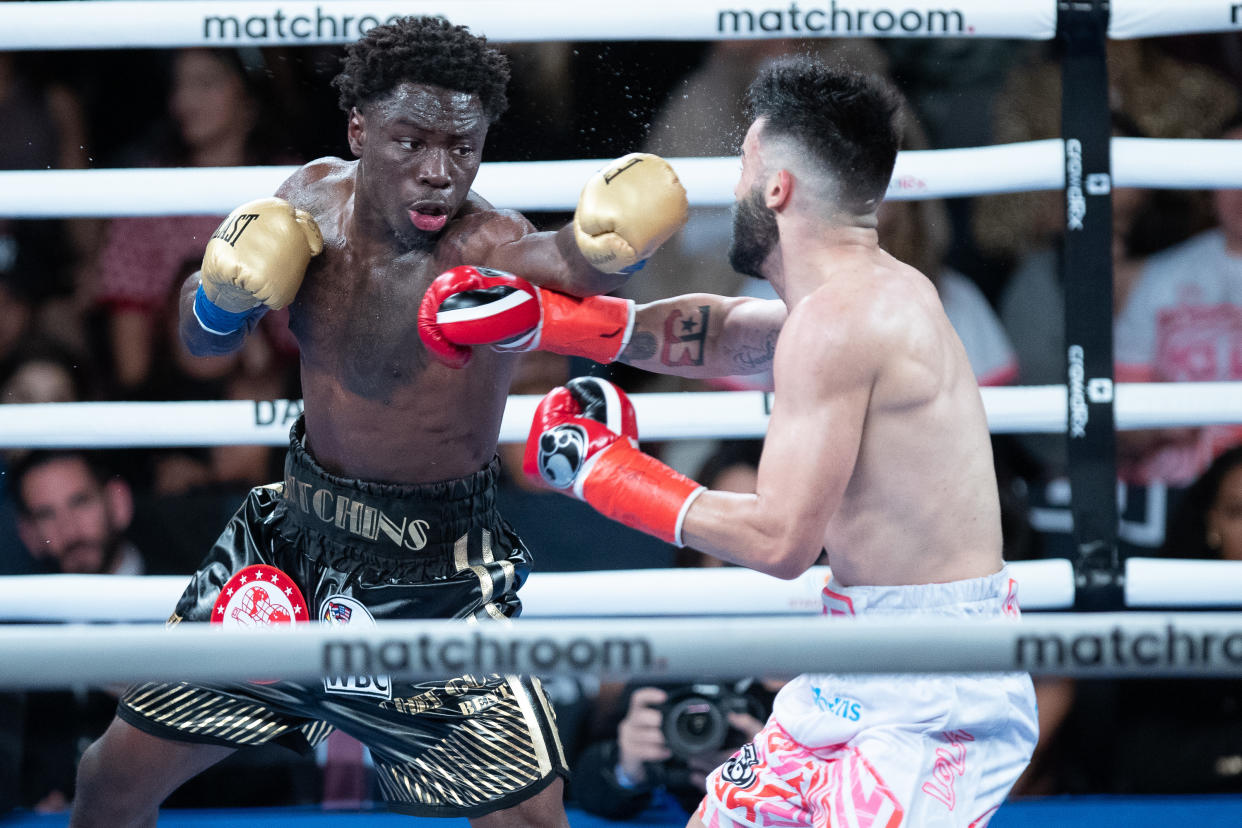 Richardson Hitchins (left), coming off a Feb. 4 victory in New York over John Bauza, believes he has what it takes to become a world champion. (Edward Diller/Getty Images)