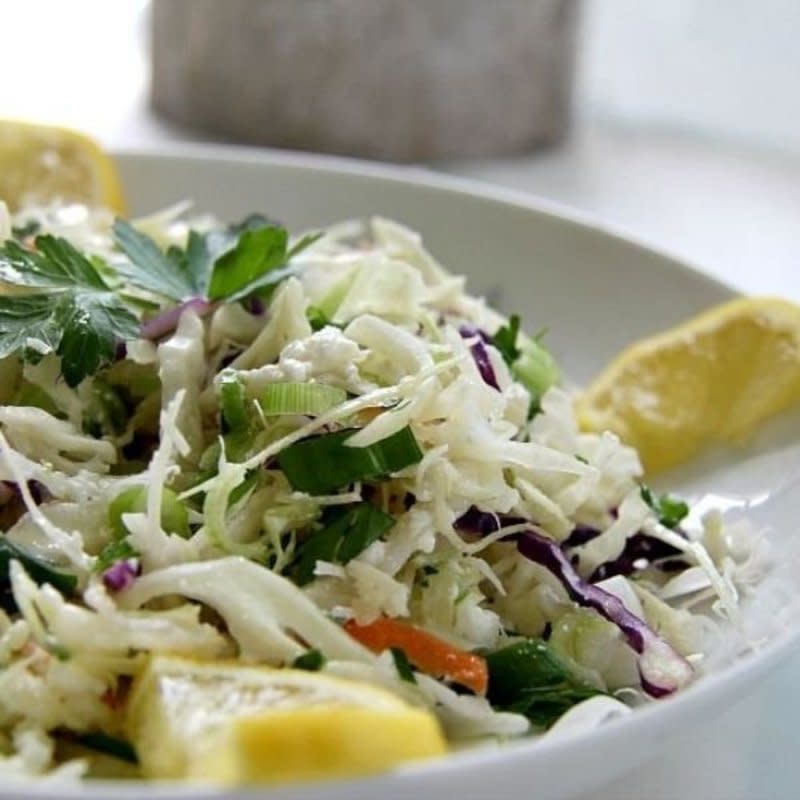 <p>Divalicious Recipes</p><p>This tangy coleslaw is made with a creamy feta dressing in place of mayonnaise. </p><p><strong>Get the recipe: <a href="https://divaliciousrecipes.com/feta-lemon-coleslaw/" rel="nofollow noopener" target="_blank" data-ylk="slk:Feta Lemon Coleslaw;elm:context_link;itc:0;sec:content-canvas" class="link ">Feta Lemon Coleslaw</a></strong></p>