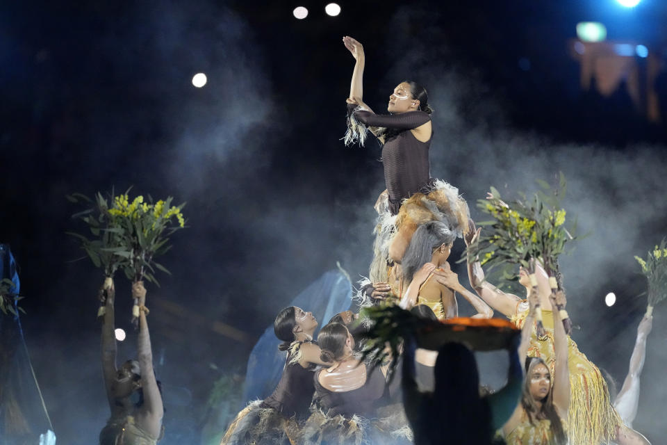 Traditional dancers perform on the pitch before the Women's World Cup soccer match between Australia and Ireland at Stadium Australia in Sydney, Australia, Thursday, July 20, 2023. (AP Photo/Mark Baker)