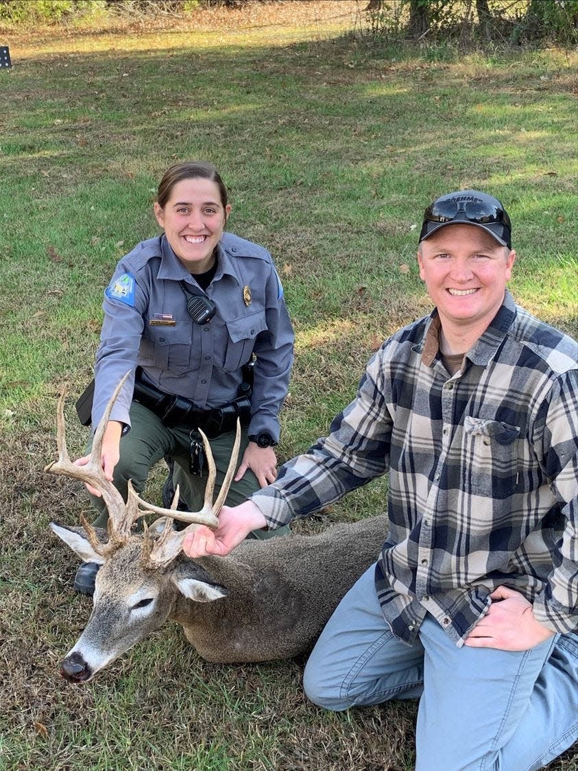 Monroe County Agent Jessica Filla and Samuel Perotti pose with this 16-point deer.