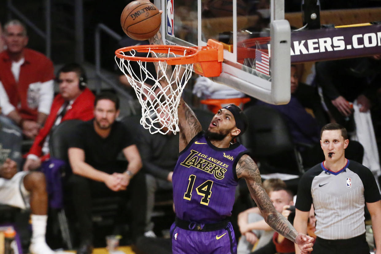 LOS ANGELES, CA - MARCH 1: Brandon Ingram #14 of the Los Angeles Lakers dunks the ball against the Milwaukee Bucks on March 1 2019 at STAPLES Center in Los Angeles, California. NOTE TO USER: User expressly acknowledges and agrees that, by downloading and/or using this Photograph, user is consenting to the terms and conditions of the Getty Images License Agreement. Mandatory Copyright Notice: Copyright 2019 NBAE (Photo by Chris Elise/NBAE via Getty Images)
