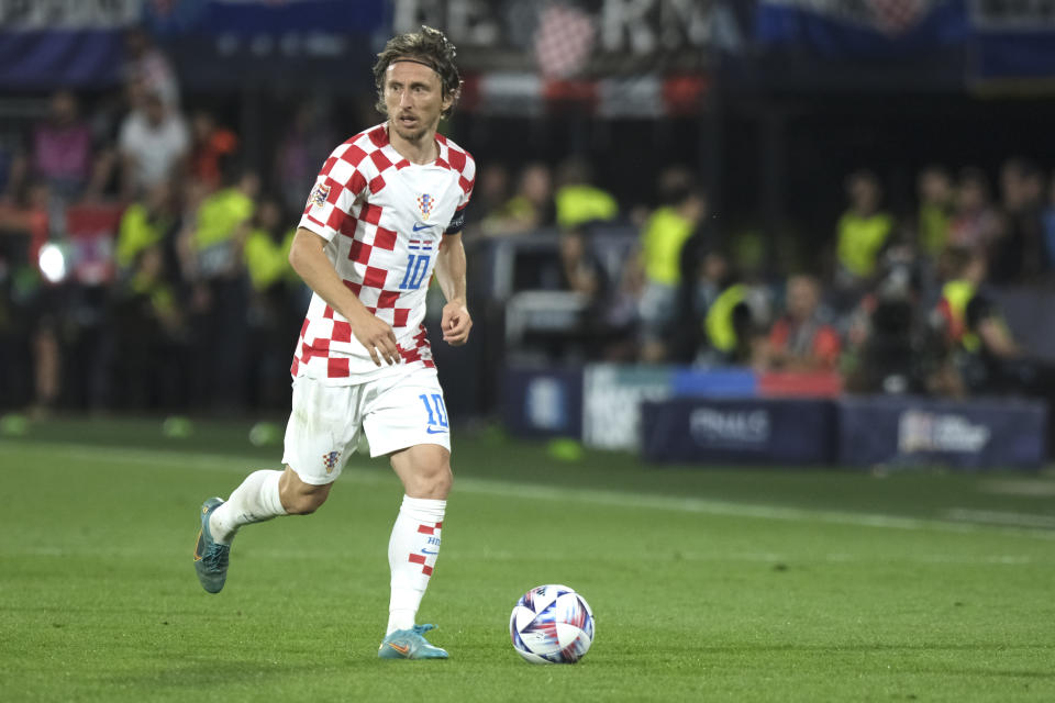 Croatia's Luka Modric controls the ball during the Nations League semifinal soccer match between the Netherlands and Croatia at De Kuip stadium in Rotterdam, Netherlands, Wednesday, June 14, 2023. (AP Photo/Patrick Post)