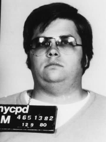 <p>Bureau of Prisons/Getty </p> John Lennon's killer Mark David Chapman.