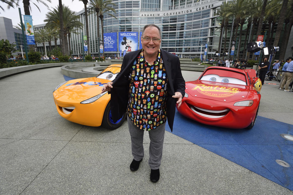 ANAHEIM, CA - JULY 14: John Lasseter,  the chief creative officer of Pixar Animation Studios, Walt Disney Animation Studios, and DisneyToon Studios, shows off a shirt that has at least one character from every Pixar movie he has worked on outside D23 Expo in Anaheim, on Friday, July 14, 2017.     (Photo by Jeff Gritchen/Digital First Media/Orange County Register via Getty Images)