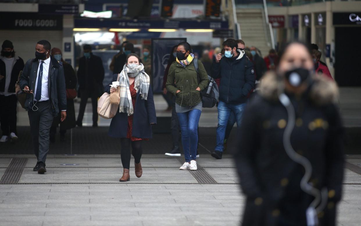 Passengers at Victoria Station in London, which is set to be one of the 10 busiest in the country over the five-day Christmas window - Hollie Adams/AFP