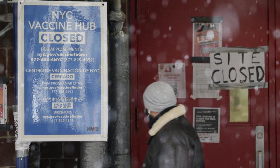 A closed sign hangs outside of a school used to distribute coronavirus vaccine in New York City on Tuesday