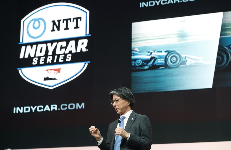 Tsuneshia Okuno, an executive vice president at NTT talks about the sponsorship deal with IndyCar Series during a news conference, Tuesday, Jan. 15, 2019, at the North American International Auto Show in Detroit. IndyCar has signed a multi-year title sponsorship deal with NTT, a global information technology and communications leader. The partnership was revealed Tuesday and makes NTT the official technology partner of the IndyCar Series, Indianapolis Motor Speedway, the Indianapolis 500 and NASCAR's Brickyard 400. NTT replaces Verizon, which was title sponsor of the series from 2014 until it ended its partnership last season. (AP Photo/Carlos Osorio)