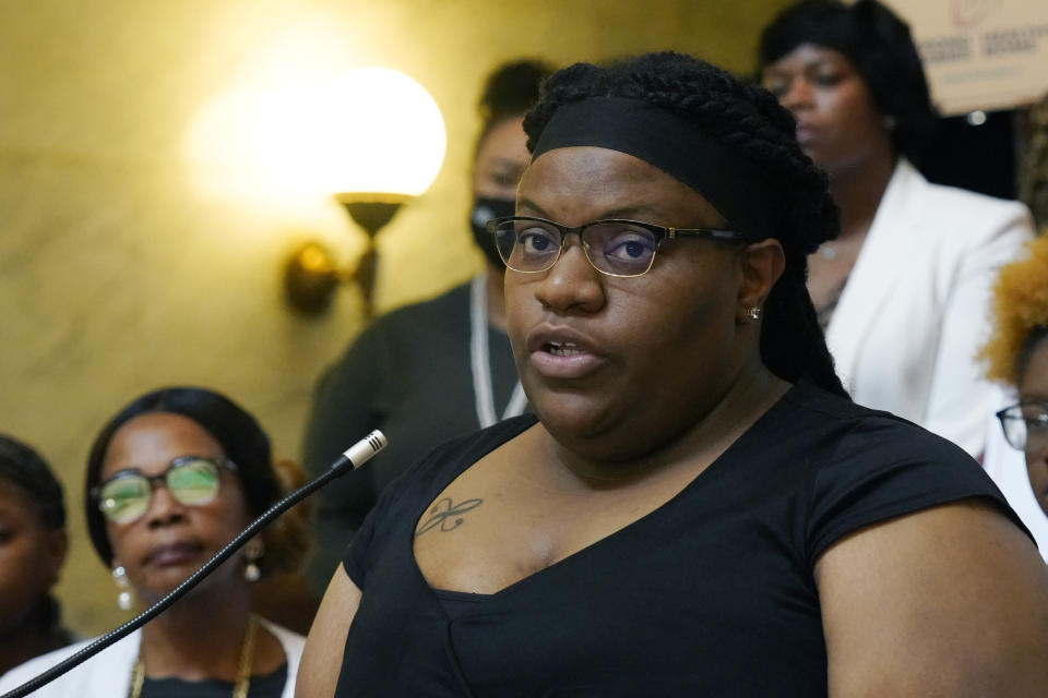 Brittany Lampkin of Yazoo County, extolls the Mississippi Black Women's Roundtable legislative agenda which includes extending postpartum coverage for Medicaid recipients up from the current 60-day window to 12 months, Thursday, Jan. 26, 2023, during a news conference at the Mississippi Capitol in Jackson. A three-time mother, Lampkin related her personal experiences as evidence for the need of greater health care and support for mothers. (AP Photo/Rogelio V. Solis)