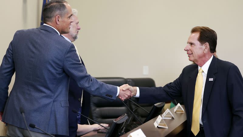 Olympic and Paralympic Winter Games Coordination Committee Co-Chairman Sen. Mike McKell, R-Spanish Fork, left, shakes hands with Fraser Bullock, president and CEO of the Salt Lake City-Utah Committee for the Games, following the first meeting of Utah Legislature’s Olympic Coordination Committee at the Capitol in Salt Lake City on Thursday, June 15, 2023.