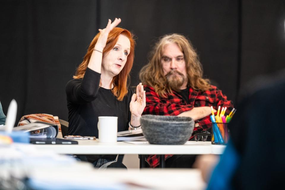 Director Mary Francis Moore, left, and Tom Wilson at a rehersal for the musical that will premier at Theatre Aquarius on April 24, 2024.