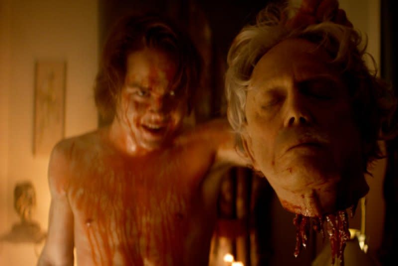 Judah Lewis (L) spoils Bruce Davison's fate in "Suitable Flesh." Photo courtesy of AMP and Eyevox