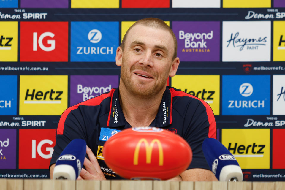 MELBOURNE, AUSTRALIA - MARCH 17: Simon Goodwin, Senior Coach of the Demons speaks to the media during the 2024 AFL Round 01 match between the Melbourne Demons and the Western Bulldogs at the Melbourne Cricket Ground on March 17, 2024 in Melbourne, Australia. (Photo by Dylan Burns/AFL Photos via Getty Images)