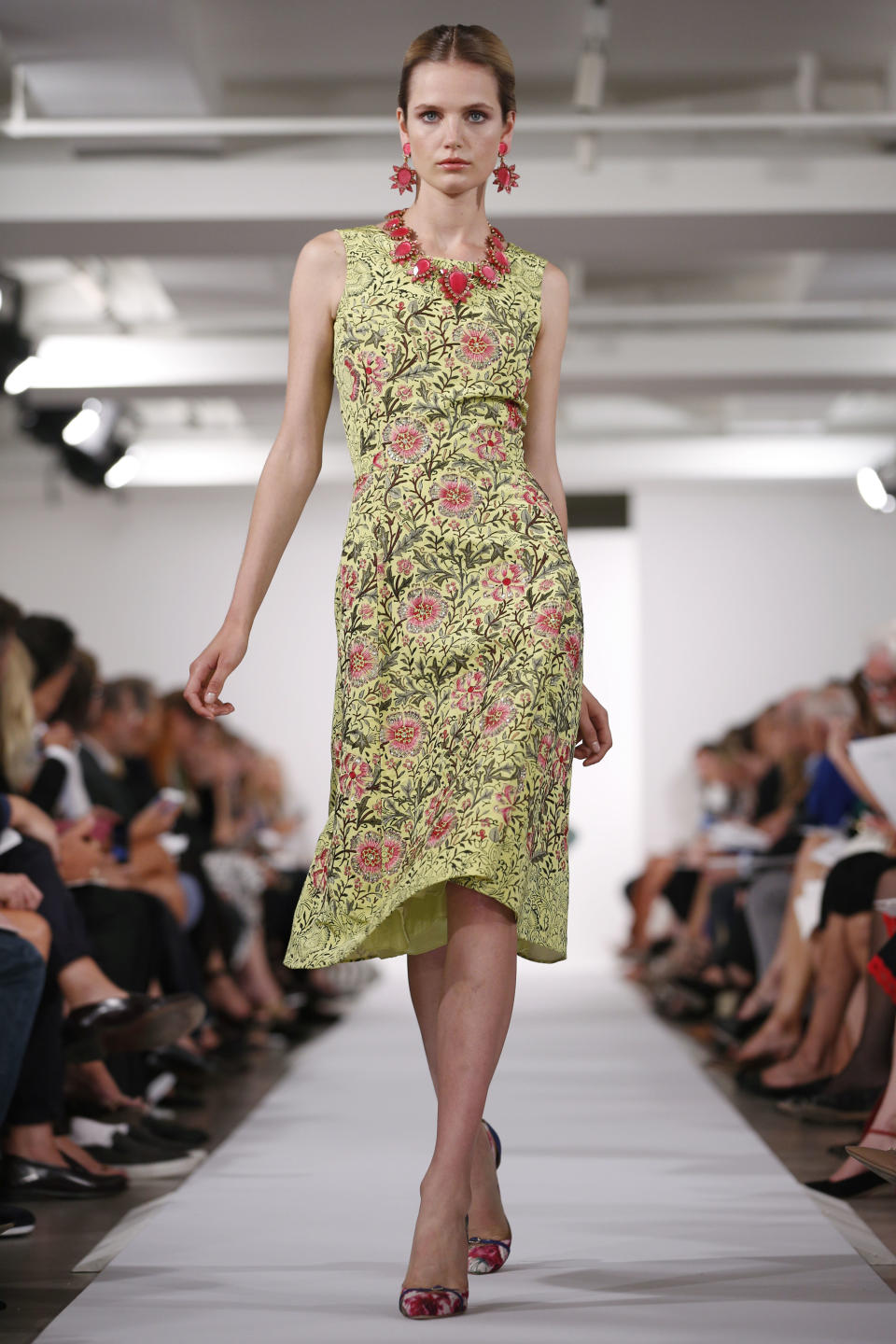 The Oscar de la Renta Spring 2014 collection is modeled during Fashion Week in New York, Tuesday, Sept. 10, 2013. (AP Photo/John Minchillo)