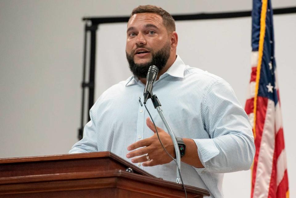 JC Brignone, a candidate for chancery clerk in Hancock County, speaks during an election forum in Waveland on Monday, July 10, 2023.