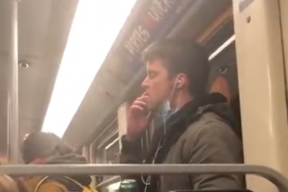 A man who was filmed licking his fingers and wiping them on a handrail on public transport was arrested by Belgian authorities: SoufOff