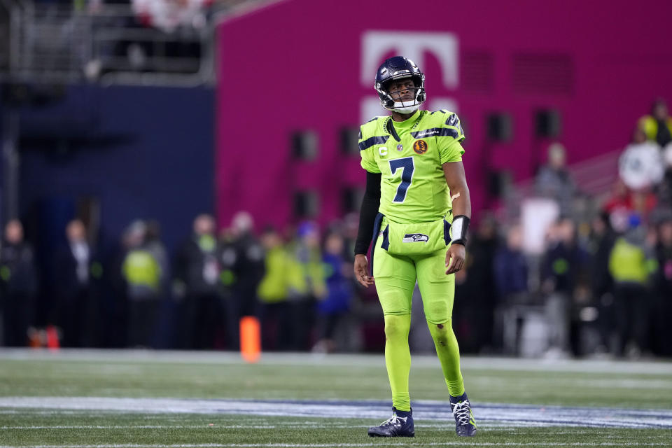 Seattle Seahawks quarterback Geno Smith walks off the field during the first half of an NFL football game against the San Francisco 49ers, Thursday, Nov. 23, 2023, in Seattle. (AP Photo/Lindsey Wasson)