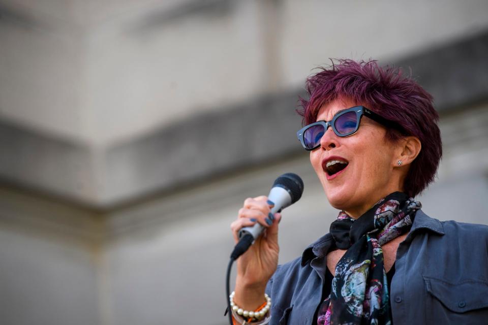 Sylvia McNair sings at the Monroe County Courthouse during the Homeless Memorial Vigil on Thursday, Sept. 29, 2022.