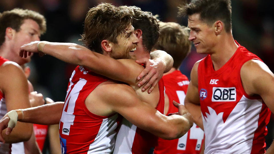 Dane Ramp celebrates the win. (Photo by Cameron Spencer/AFL Photos/Getty Images)