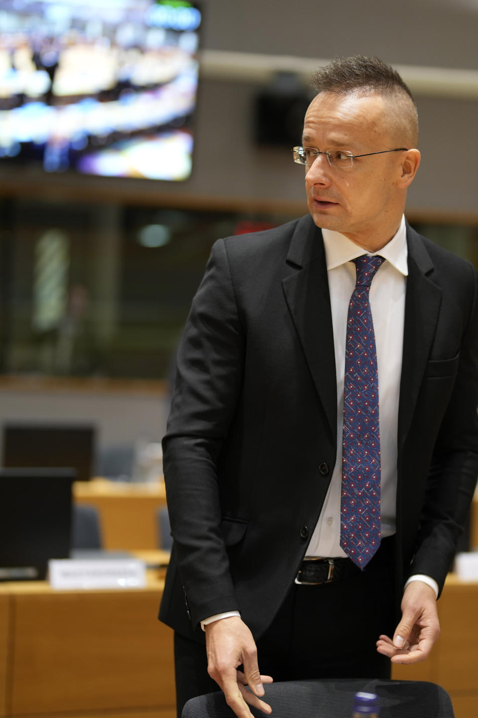 Hungary's Foreign Minister Peter Szijjarto attends a meeting of EU foreign ministers at the European Council building in Brussels, Monday, Dec. 11, 2023. Pressure mounted on Hungary on Monday not to veto the opening of European Union membership talks and the supply of economic aid to war-torn Ukraine at a pivotal EU summit this week, after Prime Minister Viktor Orban demanded that the issue be struck from the agenda. (AP Photo/Virginia Mayo)