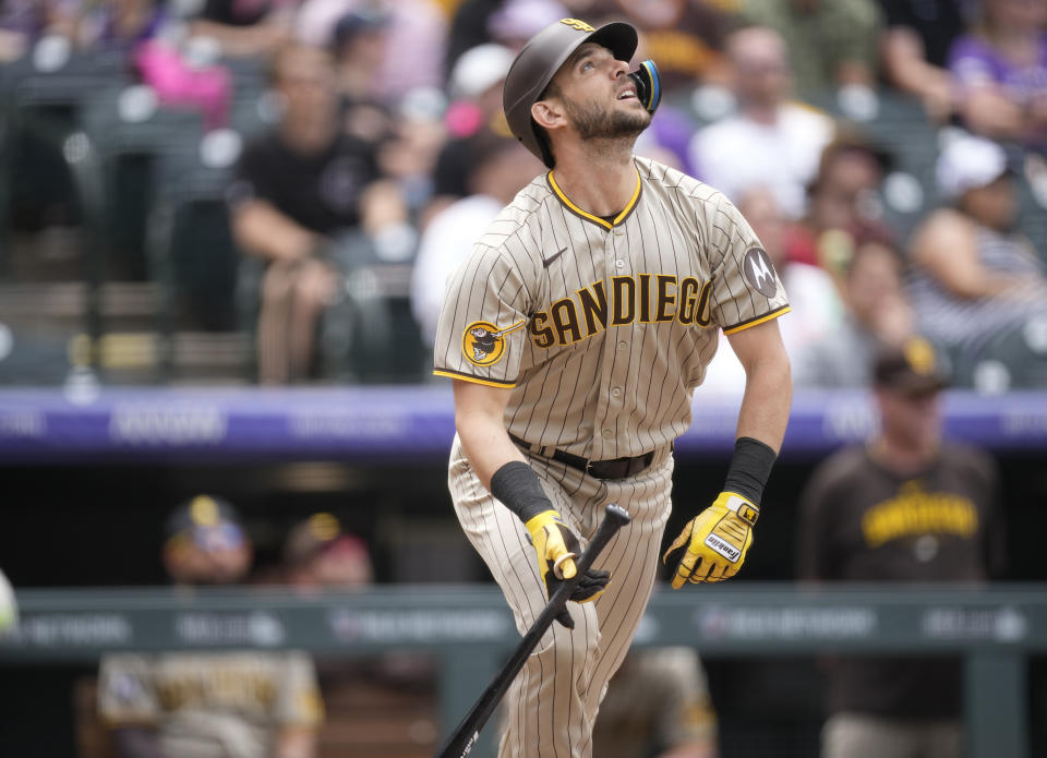 San Diego Padres' Austin Nola flies out against Colorado Rockies starting pitcher Kyle Freeland in the fourth inning of a baseball game Saturday, June 10, 2023, in Denver. (AP Photo/David Zalubowski)