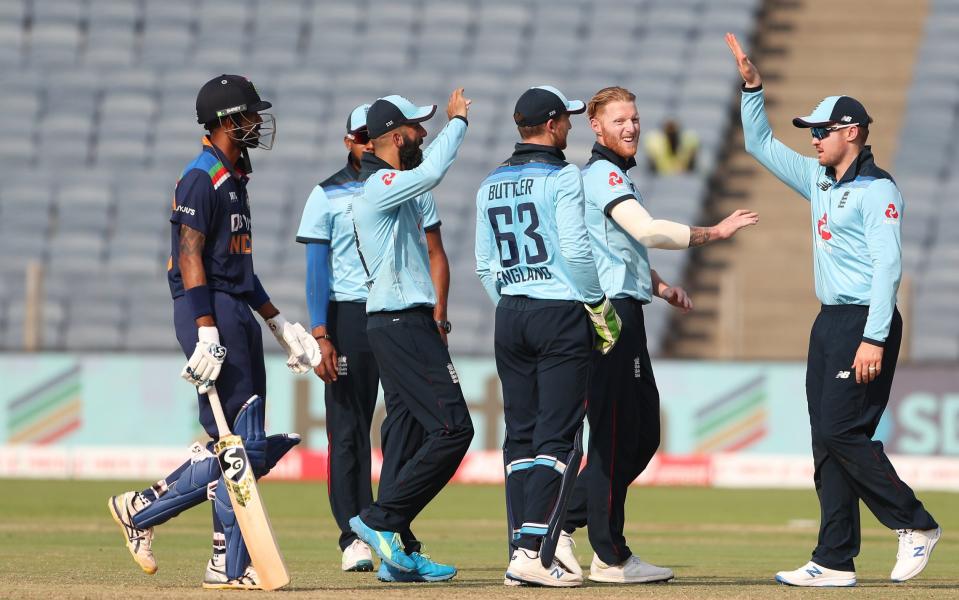 Ben Stokes of England celebrates after taking the wicket of Hardik Pandya of India with team mates Chris Jordan, Moeen Ali, Jos Buttler and Jason Roy - Surjeet Yadav/Getty Images