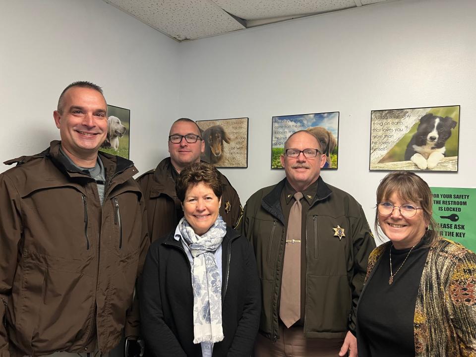 Members of the St. Joseph County Sheriff's Office and United Way Executive Director Kelly Hostetler are pictured.