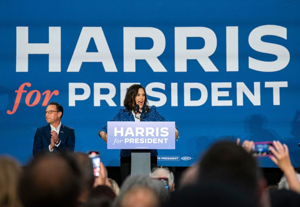 Michigan Governor Gretchen Whitmer, center, speaks alongside Pennsylvania Gov. Josh Shapiro, left, at a campaign rally for Vice President Kamala Harris at Wissahickon High School in Ambler on Monday, July 29, 2024.