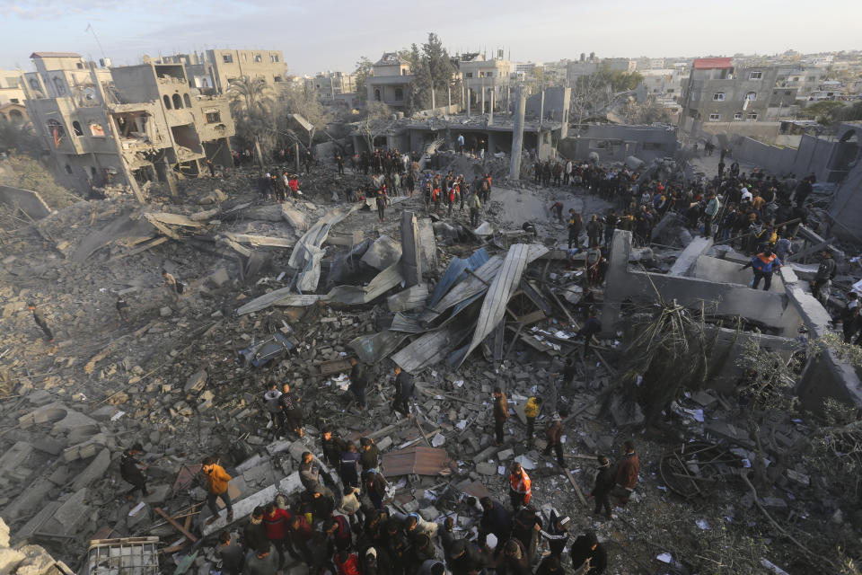 Palestinians look at a mosque destrooyed in an Israeli strike in Rafah, Gaza Strip. Wednesday, Jan. 24, 2024. (AP Photo/Hatem Ali)