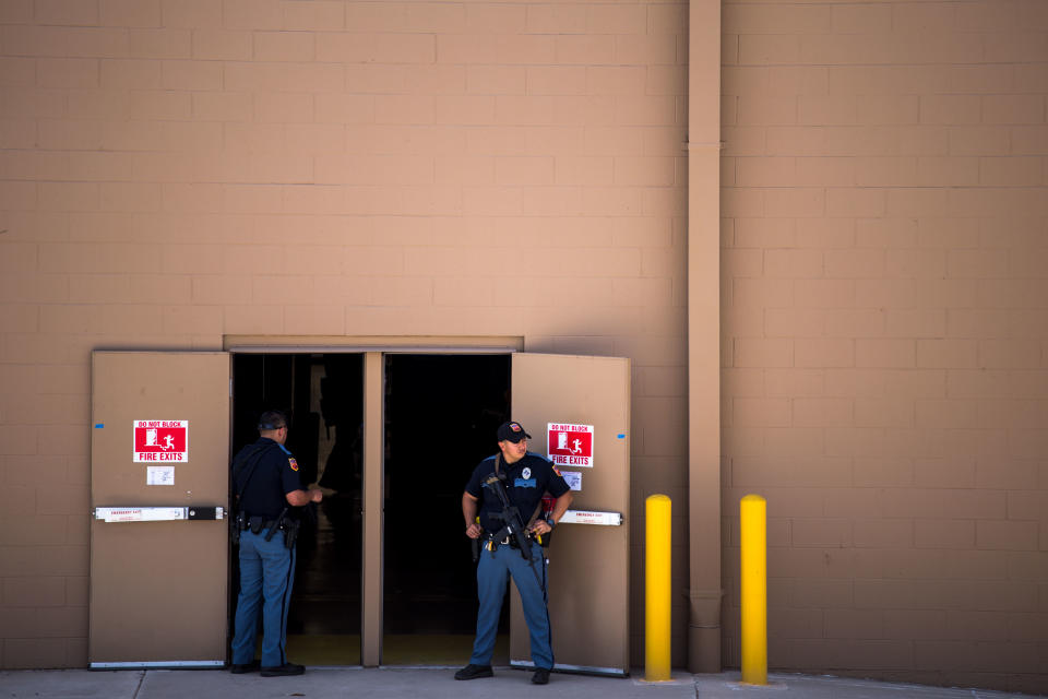 Law enforcement agencies cover the exits of a Wal-Mart where a shooting occurred near Cielo Vista Mall in El Paso, Texas, Saturday, Aug. 3, 2019. (Photo: Joel Angel Juarez/AFP/Getty Images)